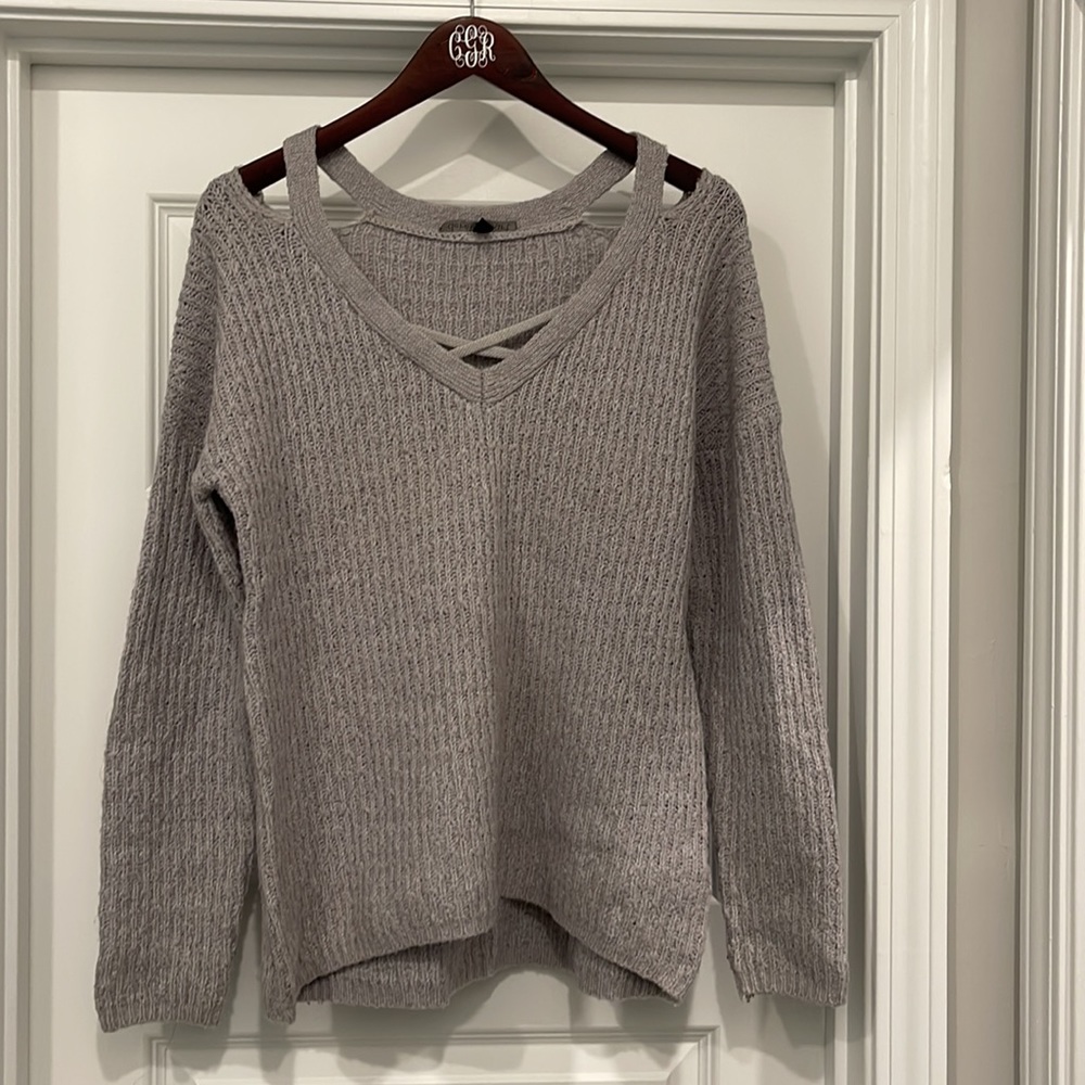 gray sweater with cold shoulder cutout detail